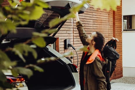 Happy Calgary EV owner with their home EV charger installed by Westland Electric